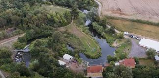 Gensyn med 100 års jubilæumsarrangementet ved Bindslev Gl. Elværk